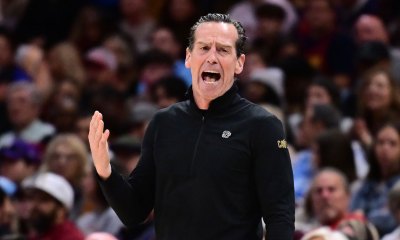 Cavaliers head coach Kenny Atkinson reacts during the second half against the Sacramento Kings at Rocket Arena with Cavs regular season in the background