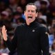 Cavaliers head coach Kenny Atkinson reacts during the second half against the Sacramento Kings at Rocket Arena with Cavs regular season in the background