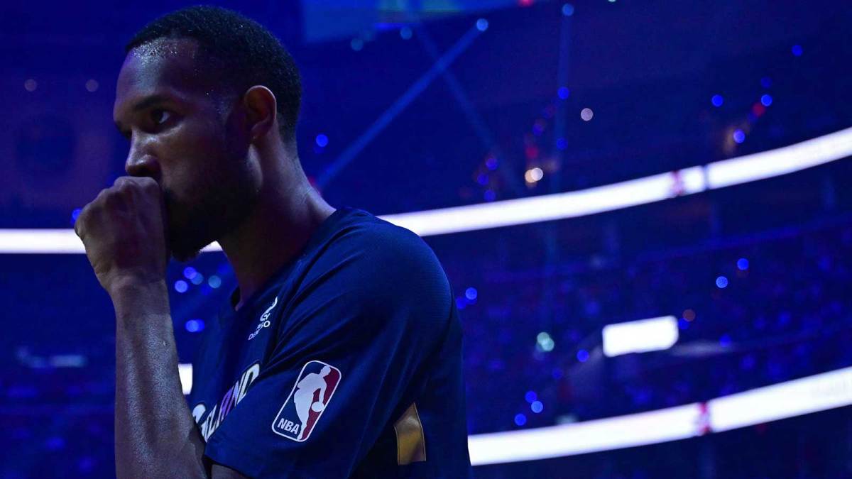 Cavaliers center Evan Mobley (4) is introduced before a game against the Houston Rockets at Rocket Arena