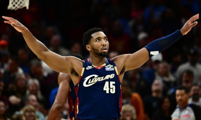 Cleveland Cavaliers guard Donovan Mitchell (45) quiets the crowd during the second half against the Chicago Bulls at Rocket Arena.