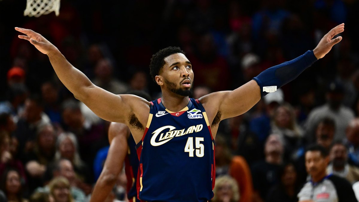 Cleveland Cavaliers guard Donovan Mitchell (45) quiets the crowd during the second half against the Chicago Bulls at Rocket Arena.