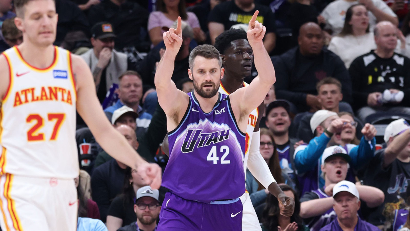 Jazz forward Kevin Love (42) reacts to a turnover by the Atlanta Hawks during the second half at Delta Center