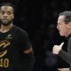 Cavaliers head coach Kenny Atkinson directs guard Darius Garland (10) and the team as they play the Minnesota Timberwolves in the fourth quarter at Target Center with Lou Williams in the background