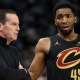 Cleveland Cavaliers guard Donovan Mitchell (45) talks with head coach Kenny Atkinson during the second quarter against the Minnesota Timberwolves at Target Center.