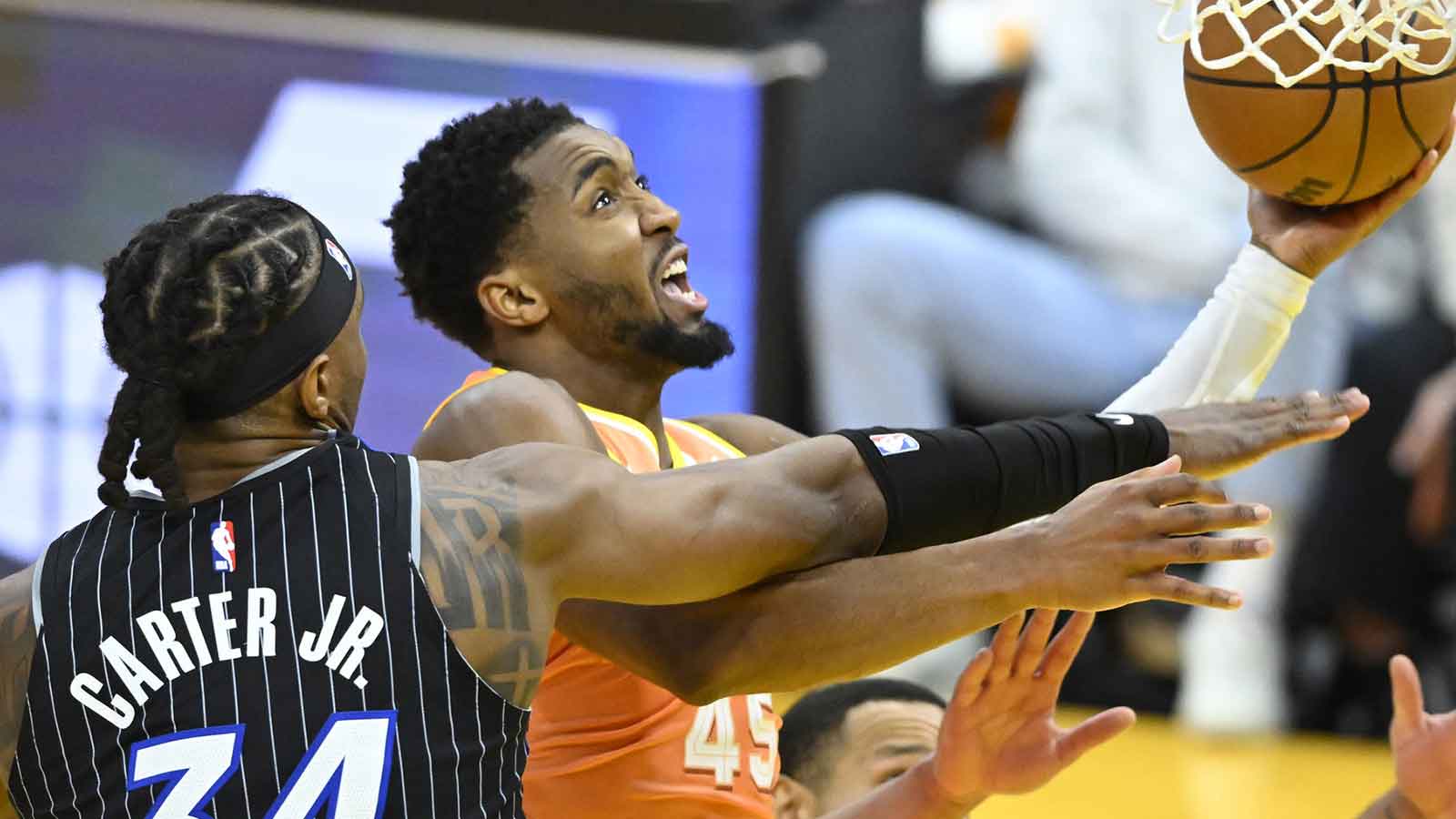Orlando Magic center Wendell Carter Jr. (34) defends a shot by Cleveland Cavaliers guard Donovan Mitchell (45) in the fourth quarter at Rocket Arena.