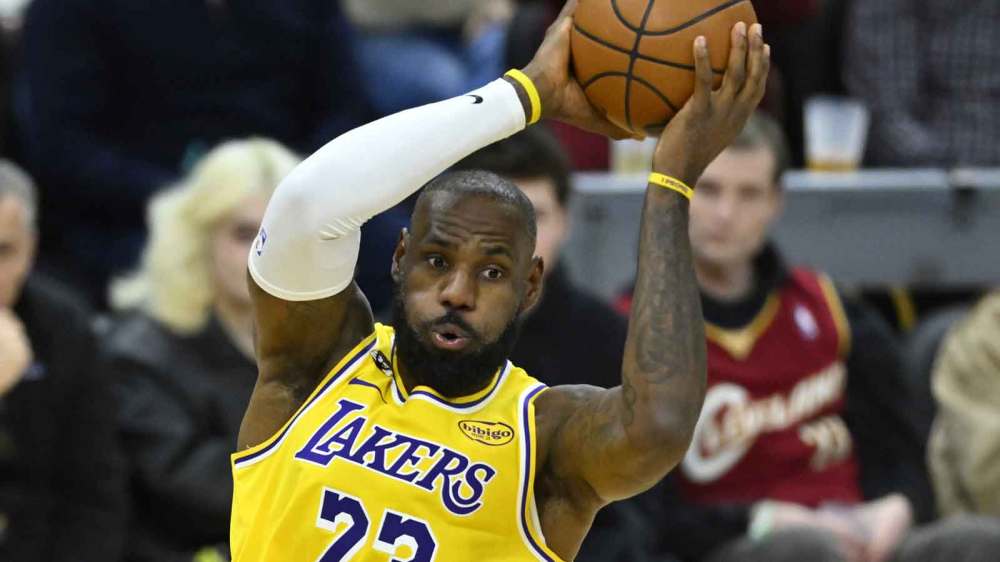 Los Angeles Lakers forward LeBron James (23) looks to pass in the fourth quarter against the Cleveland Cavaliers at Rocket Arena.