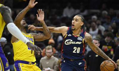 Los Angeles Lakers guard Marcus Smart (36) defends Cleveland Cavaliers guard Jaylon Tyson (20) in the third quarter at Rocket Arena.