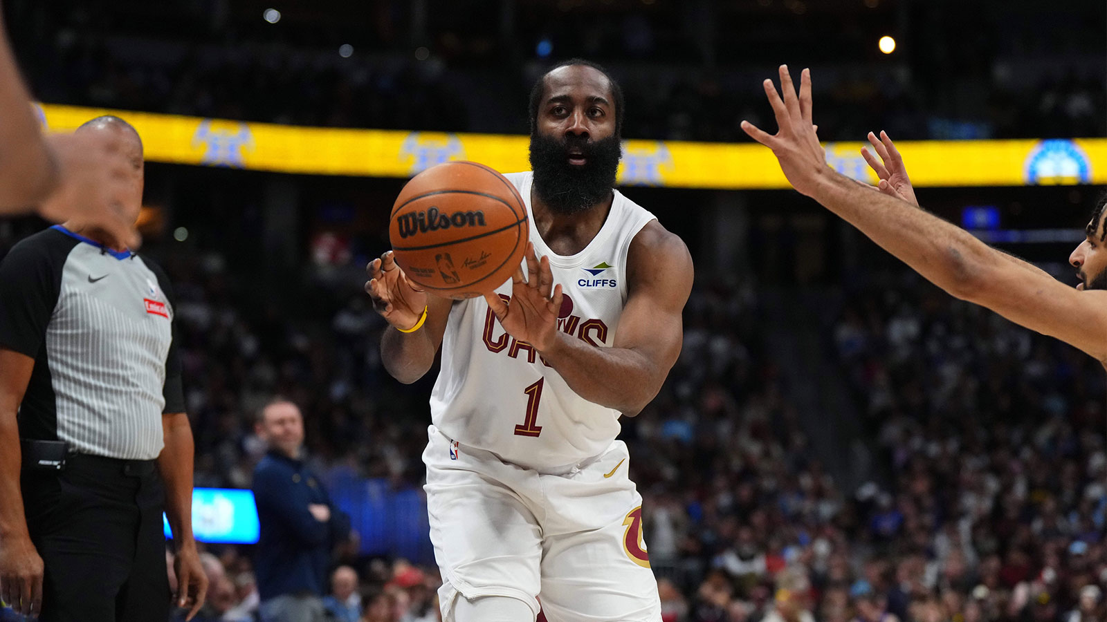 Cavaliers guard James Harden (1) passes the ball in the first quarter against the Denver Nuggets at Ball Arena