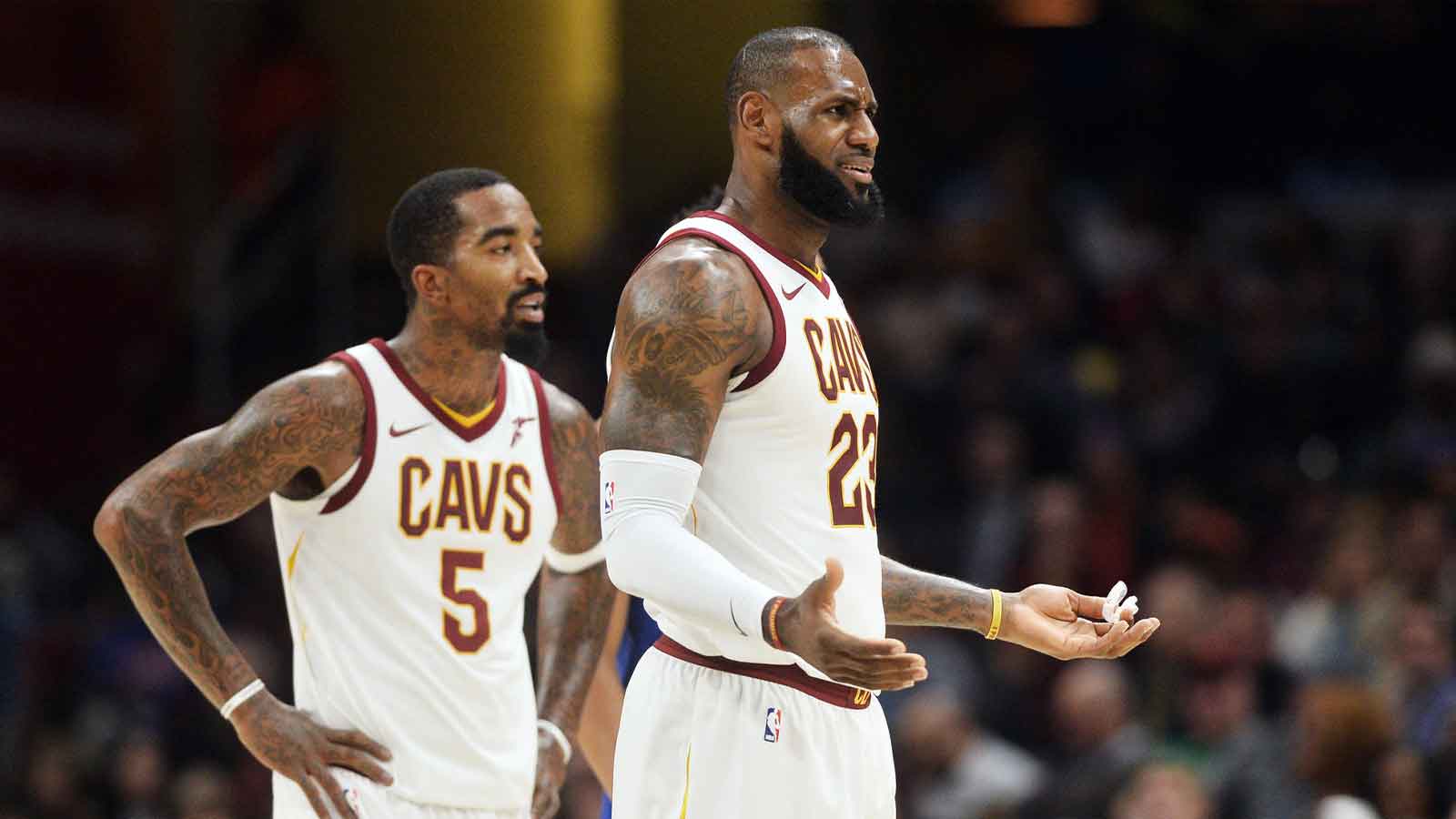 Cavaliers forward LeBron James (23) and guard JR Smith (5) react to a call during the second half against the New York Knicks at Quicken Loans Arena. The Knicks won 114-95 with Tristan Thompson in the backgroud