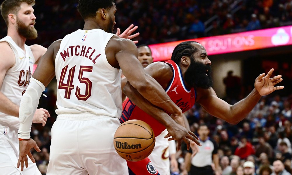 Cleveland Cavaliers guard Donovan Mitchell (45) fouls Los Angeles Clippers guard James Harden (1) during the second half at Rocket Arena.