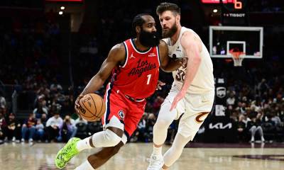 Clippers guard James Harden (1) drives to the basket against Cleveland Cavaliers forward Dean Wade (32) during the second half at Rocket Arena