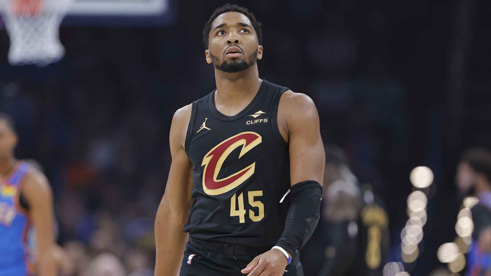 Cleveland Cavaliers guard Donovan Mitchell (45) walks down the court before a play against the Oklahoma City Thunder during the first quarter at Paycom Center. 
