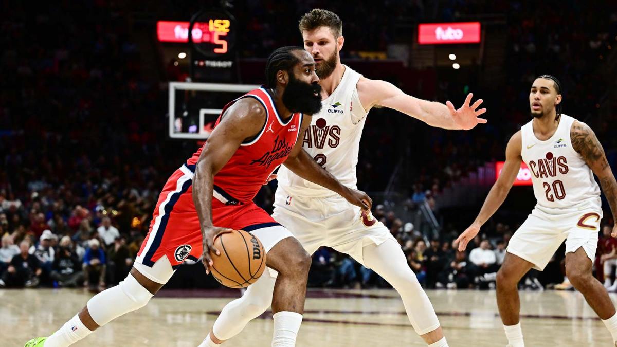 Los Angeles Clippers guard James Harden (1) drives to the basket against Cleveland Cavaliers forward Dean Wade (32) during the second half at Rocket Arena.