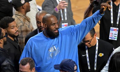 LeBron James (23) of the Los Angeles Lakers leaves the court after the championship game during the 75th NBA All Star Game at Intuit Dome with ESPN's Brian Windhorst in the background
