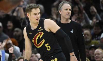 Cleveland Cavaliers guard Sam Merrill (5) reacts in front of Washington Wizards head coach Brian Keefe after making a three-point basket in the fourth quarter at Rocket Arena