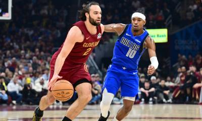 Cavs guard Max Strus (2) drives to the basket