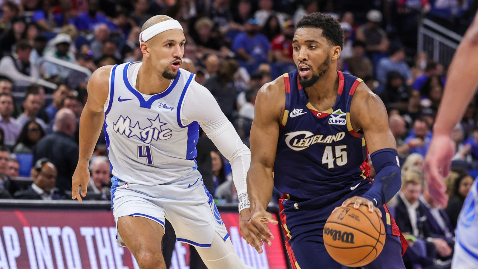 Cleveland Cavaliers guard Donovan Mitchell (45) drives to the basket against Orlando Magic guard Jalen Suggs (4) during the second half at Kia Center.