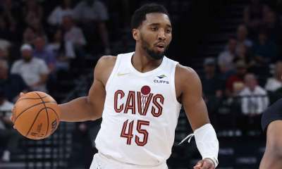 Cavs guard Donovan Mitchell (45) brings the ball up the court against the Utah Jazz during the second half at Delta Center