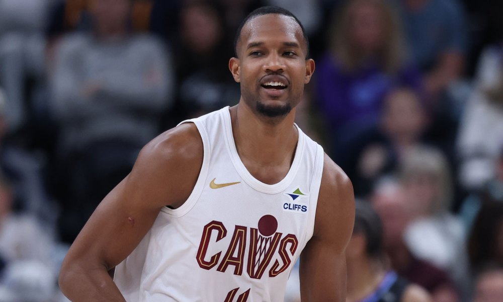 Cleveland Cavaliers center Evan Mobley (4) reacts after a play against the Utah Jazz during the first half at Delta Center with Cavs rumors in the background