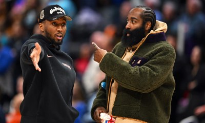 Cleveland Cavaliers guard Donovan Mitchell (left) talks with teammate James Harden during a timeout against the Detroit Pistons in the second half at Little Caesars Arena.Neither played in their overtime loss to the Pistons.