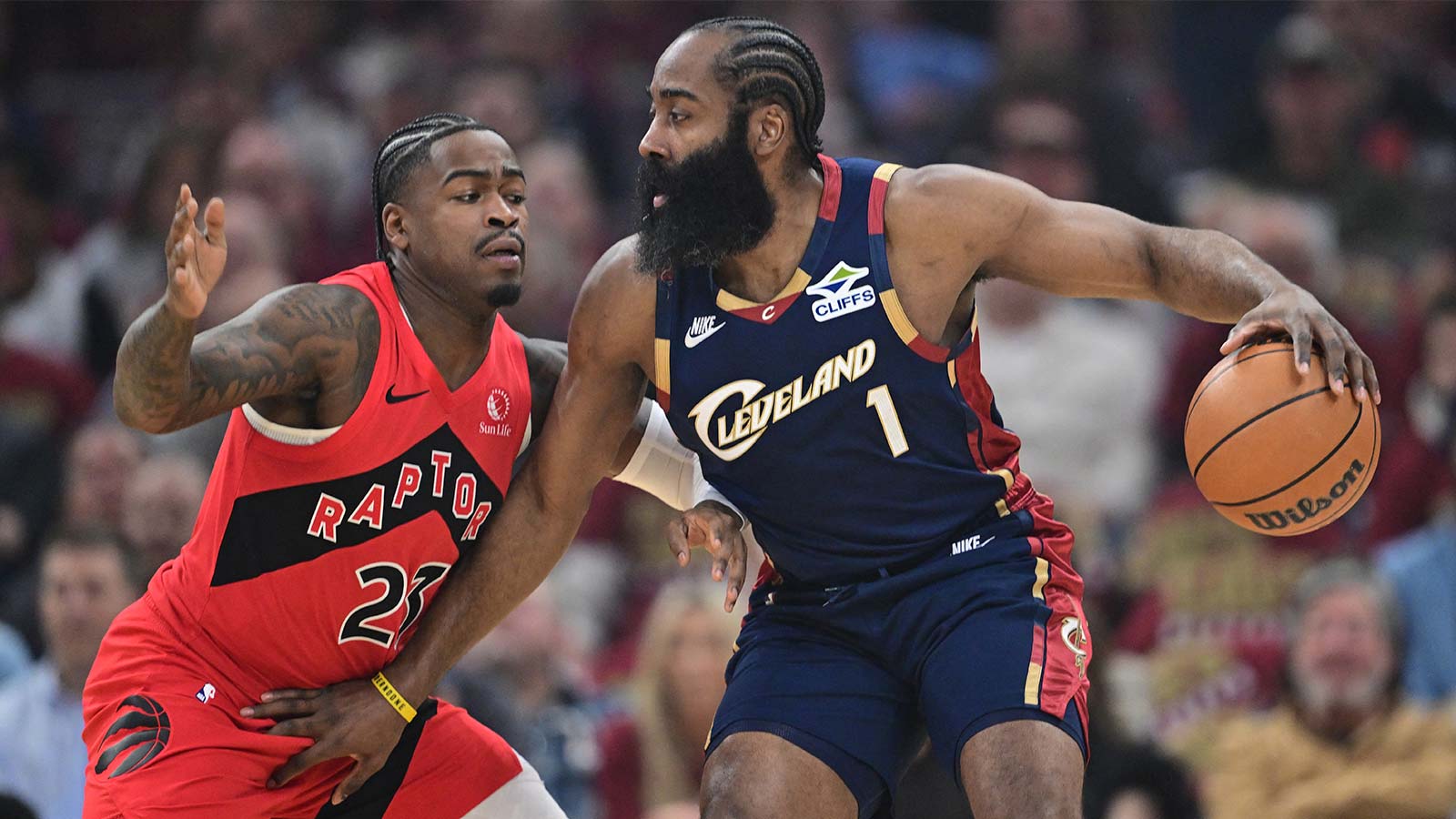 Cleveland Cavaliers guard James Harden (1) is defended by Toronto Raptors guard Jamal Shead (23) during the first half during game two of the first round of the 2026 NBA Playoffs at Rocket Arena.