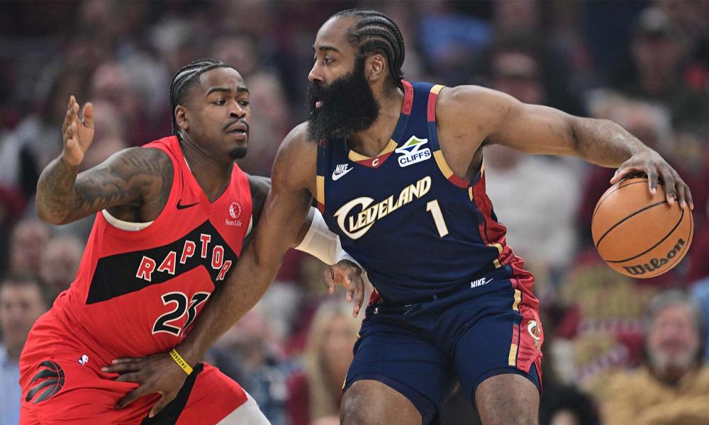 Cleveland Cavaliers guard James Harden (1) is defended by Toronto Raptors guard Jamal Shead (23) during the first half during game two of the first round of the 2026 NBA Playoffs at Rocket Arena.