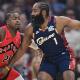 Cleveland Cavaliers guard James Harden (1) is defended by Toronto Raptors guard Jamal Shead (23) during the first half during game two of the first round of the 2026 NBA Playoffs at Rocket Arena.