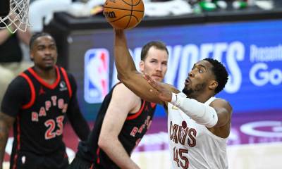 Cleveland Cavaliers guard Donovan Mitchell (45) drives to the basket against the Toronto Raptors in the third quarter of game five of the first round of the 2026 NBA Playoffs at Rocket Arena.