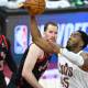 Cleveland Cavaliers guard Donovan Mitchell (45) drives to the basket against the Toronto Raptors in the third quarter of game five of the first round of the 2026 NBA Playoffs at Rocket Arena.