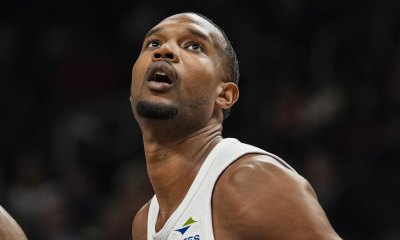 Cleveland Cavaliers center Evan Mobley (4) watches a shot against the Atlanta Hawks during the first half at State Farm Arena.