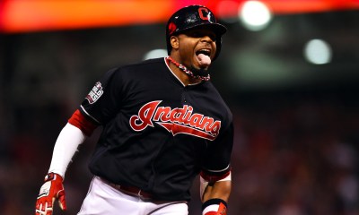 Cleveland Indians center fielder Rajai Davis (20) celebrates after hitting a two-run home run against the Chicago Cubs in the 8th inning in game seven of the 2016 World Series at Progressive Field.