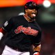 Cleveland Indians center fielder Rajai Davis (20) celebrates after hitting a two-run home run against the Chicago Cubs in the 8th inning in game seven of the 2016 World Series at Progressive Field.