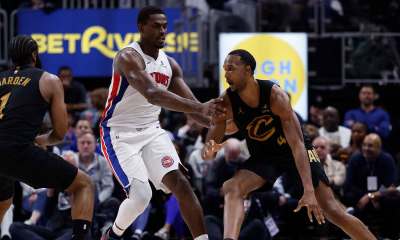 Cleveland Cavaliers center Evan Mobley (4) dribbles defended by Detroit Pistons center Jalen Duren (0) in the second half during game one of the second round of the 2026 NBA Playoffs at Little Caesars Arena.