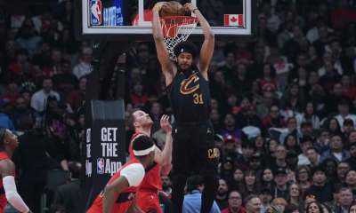 May 1, 2026; Toronto, Ontario, CAN; Cleveland Cavaliers center Jarrett Allen (31) scores a basket over Toronto Raptors center Jakob Poeltl (19) during the first quarter in game six of the first round of the 2026 NBA Playoffs at Scotiabank Arena.