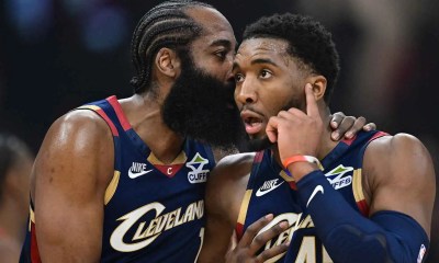 Cavs guard Donovan Mitchell (45) talks with guard James Harden