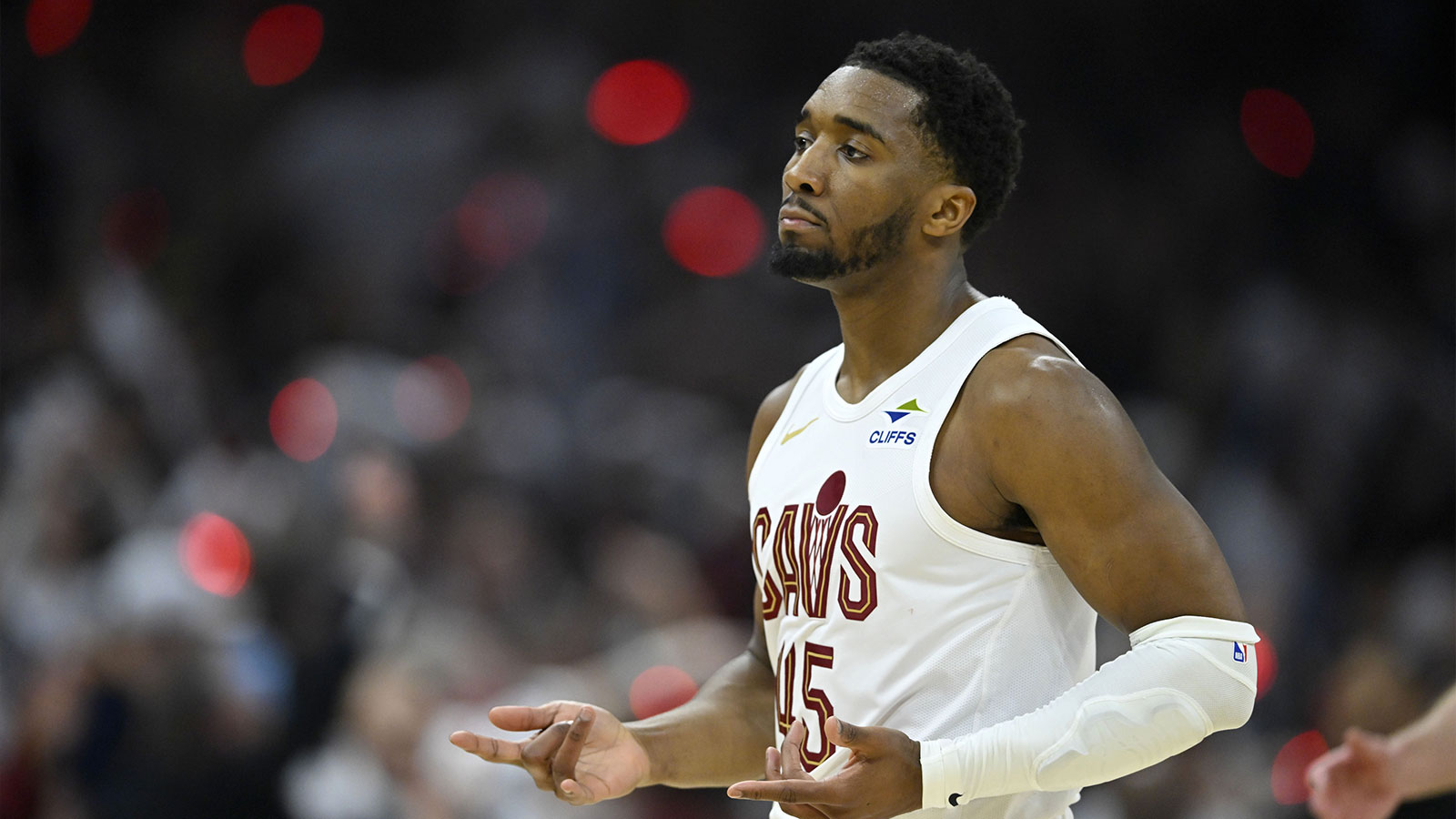 Cavs guard Donovan Mitchell (45) celebrates his three-point basket against the Toronto Raptors in the first quarter of game five of the first round of the 2026 NBA Playoffs at Rocket Arena