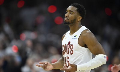 Cavs guard Donovan Mitchell (45) celebrates his three-point basket against the Toronto Raptors in the first quarter of game five of the first round of the 2026 NBA Playoffs at Rocket Arena