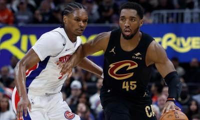 Cavs' Donovan Mitchell dribbles against Pistons' Ausar Thompson