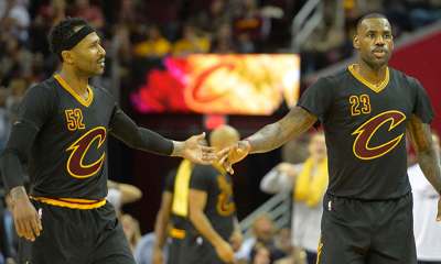 Cavs forward LeBron James (23) reacts with guard Mo Williams
