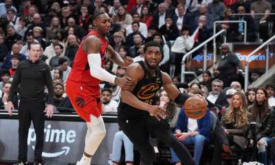 Cavs guard Donovan Mitchell (45) controls the ball