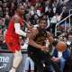 Cavs guard Donovan Mitchell (45) controls the ball