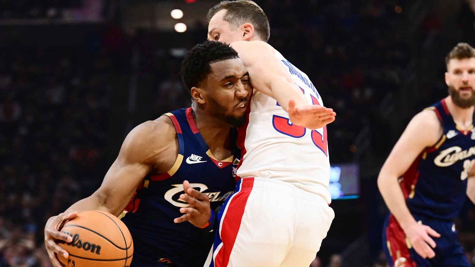 Cavs guard Donovan Mitchell (45) drives to the basket
