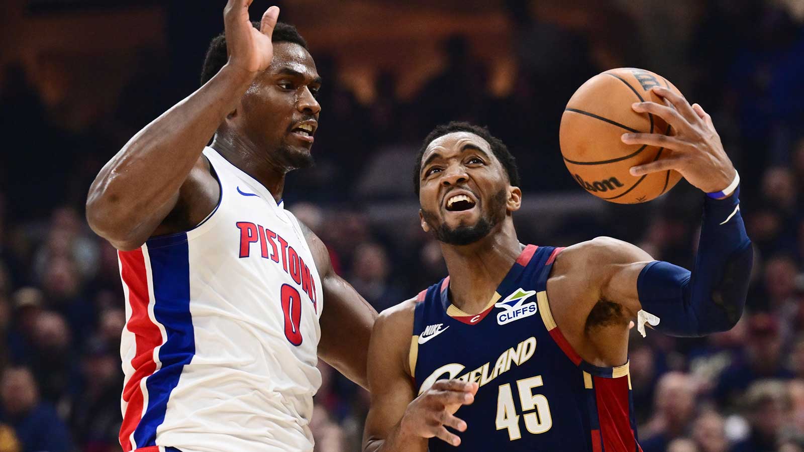 Cavaliers guard Donovan Mitchell (45) drives to the basket against Detroit Pistons center Jalen Duren (0) during the first quarter in game six of the second round of the 2026 NBA Playoffs at Rocket Arena