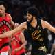 Toronto Raptors forward Scottie Barnes (4) goes for a loose ball against Cleveland Cavaliers center Jarrett Allen (31) during the second half of game seven in the first round of the 2026 NBA Playoffs at Rocket Arena.