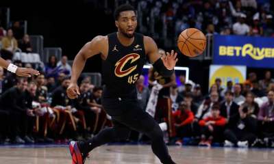 Cleveland Cavaliers guard Donovan Mitchell (45) dribbles in the first half against the Detroit Pistons during game one of the second round of the 2026 NBA Playoffs at Little Caesars Arena.