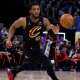 Cleveland Cavaliers guard Donovan Mitchell (45) dribbles in the first half against the Detroit Pistons during game one of the second round of the 2026 NBA Playoffs at Little Caesars Arena.