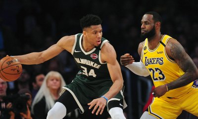 Milwaukee Bucks forward Giannis Antetokounmpo (34) controls the ball against Los Angeles Lakers forward LeBron James (23) during the first half at Staples Center.