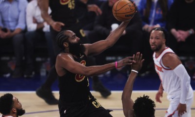 Cleveland Cavaliers guard James Harden (1) drives to the basket against New York Knicks center Karl-Anthony Towns (32), forward Og Anunoby (8), and guard Jalen Brunson (11) during the first quarter of game one of the eastern conference finals during the 2026 NBA playoffs at Madison Square Garden.