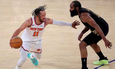 New York Knicks guard Jalen Brunson (11) controls the ball against Cleveland Cavaliers guard James Harden (1) during the fourth quarter of game one of the eastern conference finals during the 2026 NBA playoffs at Madison Square Garden.