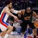 Cleveland Cavaliers guard James Harden (1) dribbles defended by Detroit Pistons guard Cade Cunningham (2) in the first half during game two of the second round of the 2026 NBA Playoffs at Little Caesars Arena.